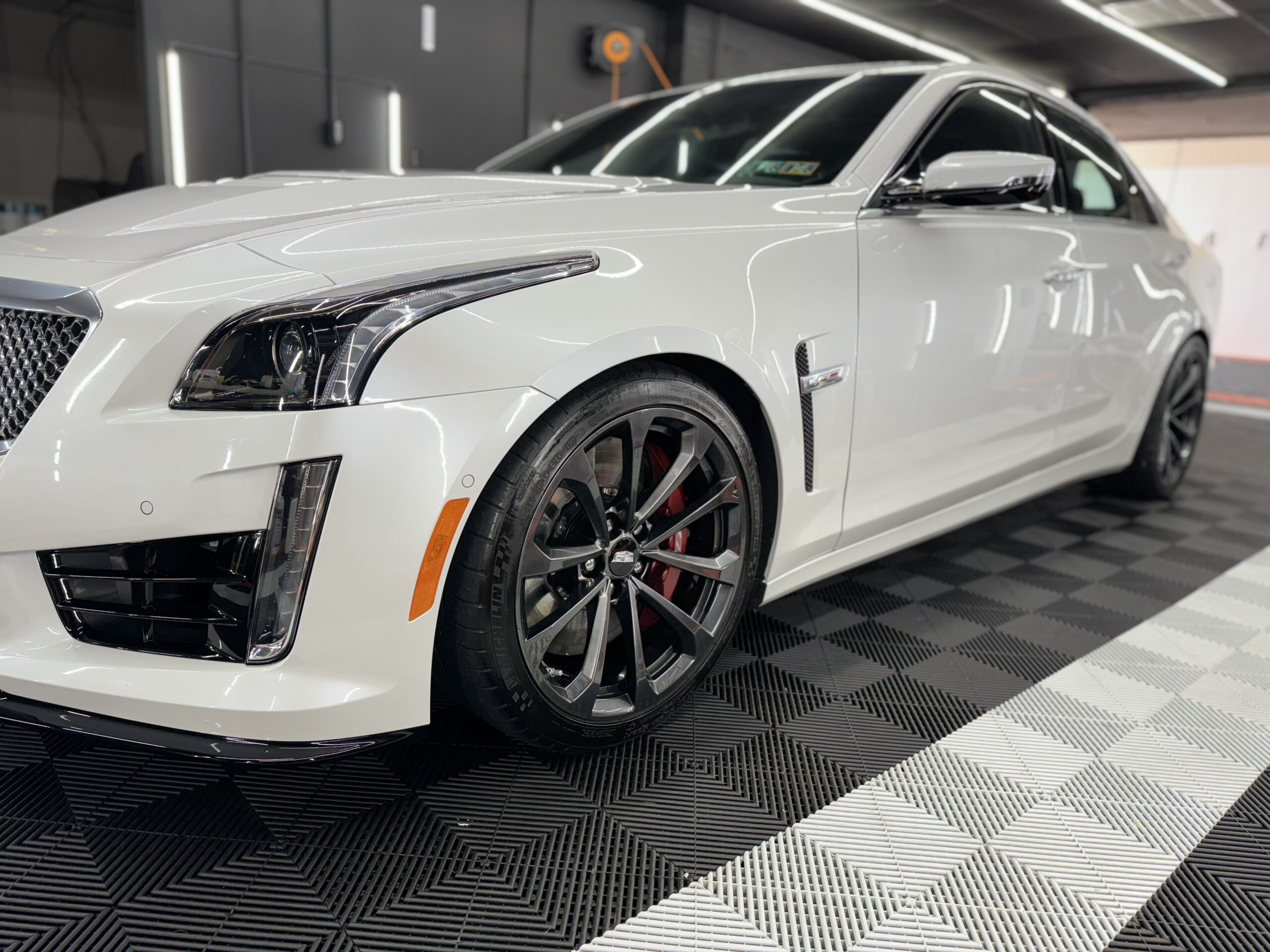 White Cadillac exterior professionally detailed by Mike Details
